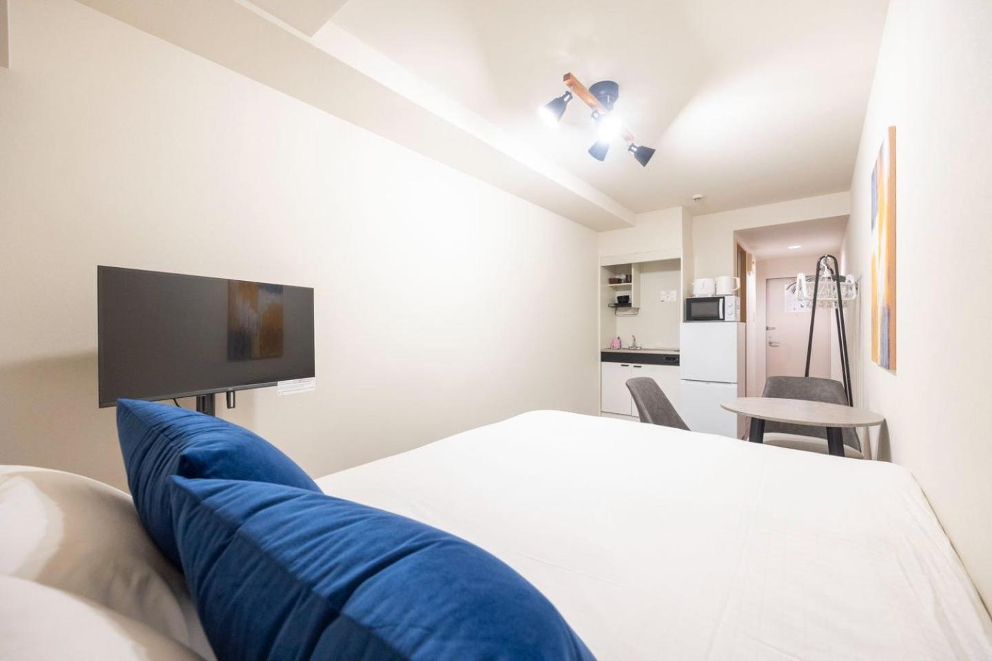 Apartamento Shinjuku Okada Building Tokio Habitación foto
