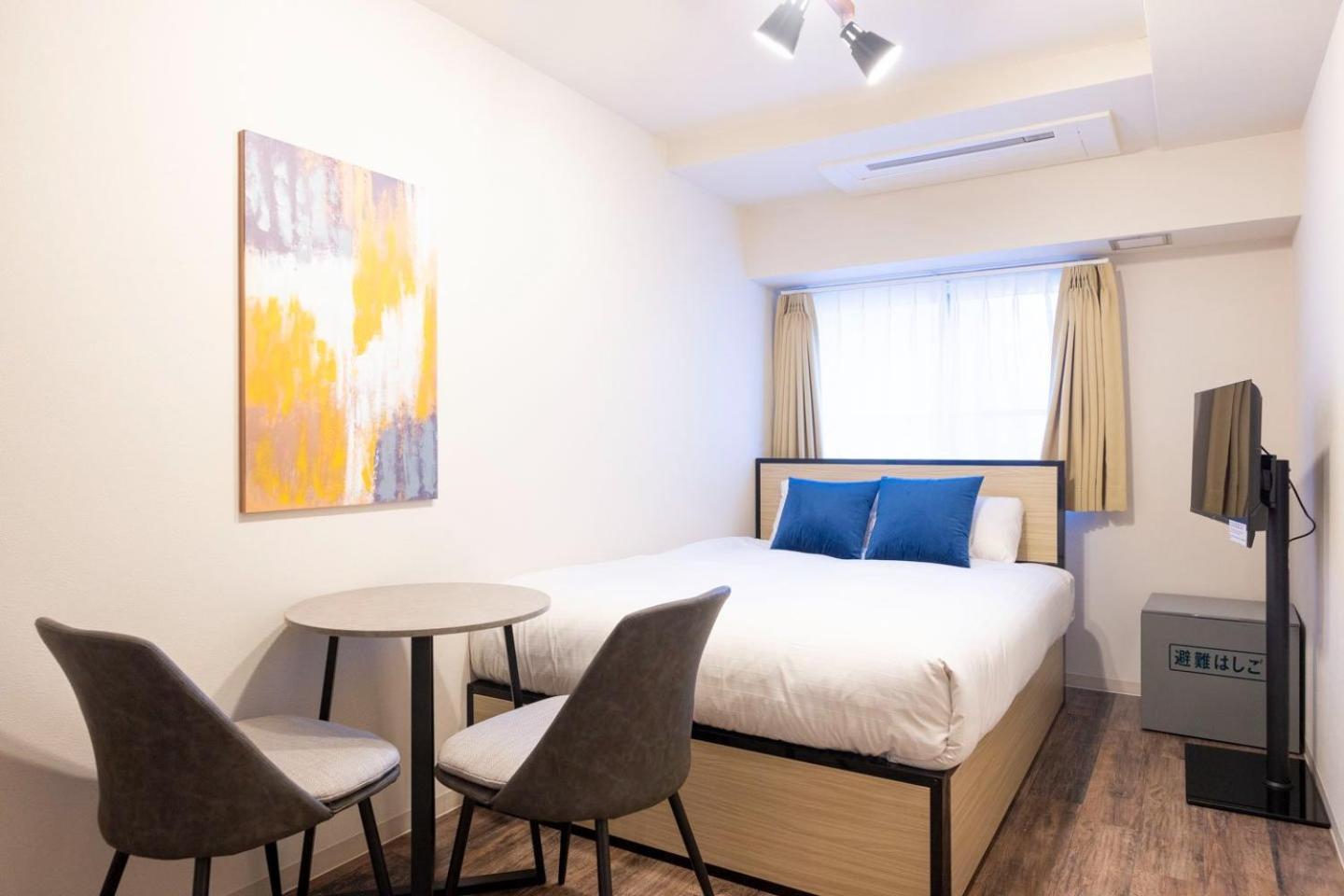 Apartamento Shinjuku Okada Building Tokio Habitación foto