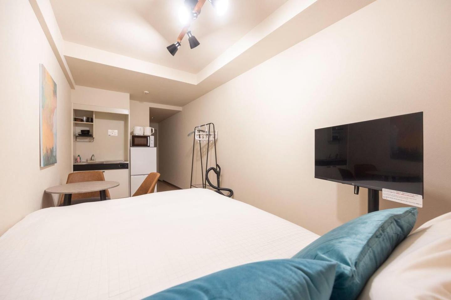 Apartamento Shinjuku Okada Building Tokio Habitación foto