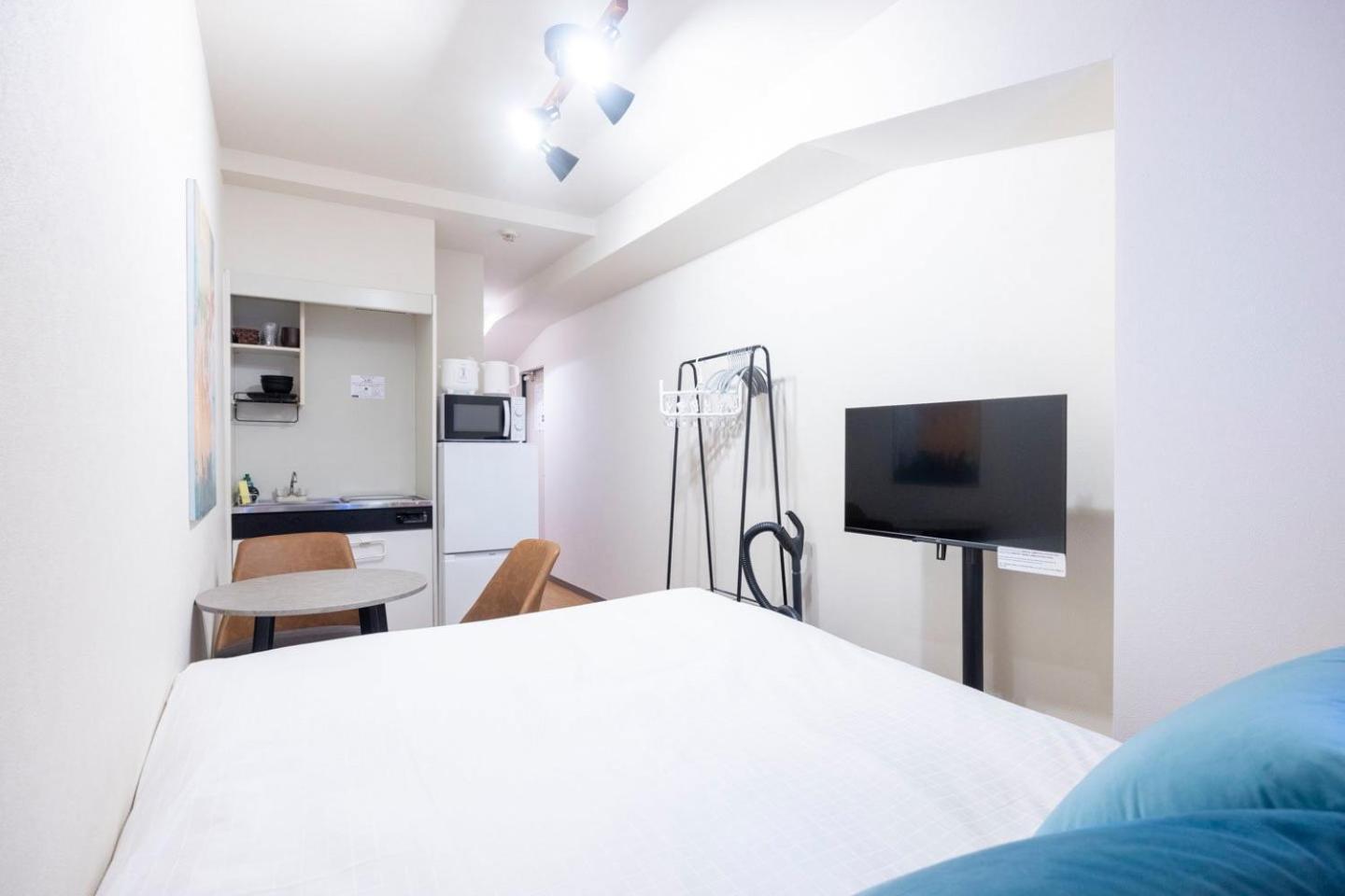 Apartamento Shinjuku Okada Building Tokio Habitación foto