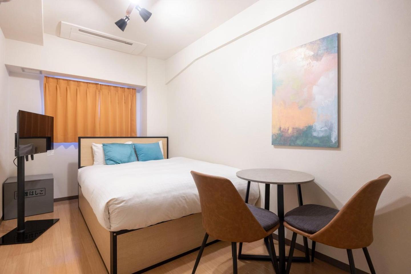 Apartamento Shinjuku Okada Building Tokio Habitación foto