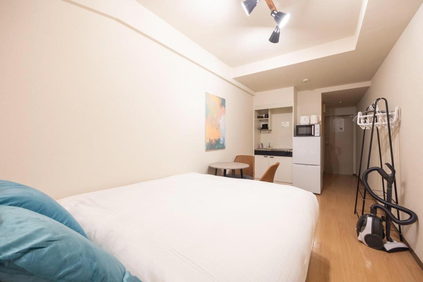 Apartamento Shinjuku Okada Building Tokio Habitación foto