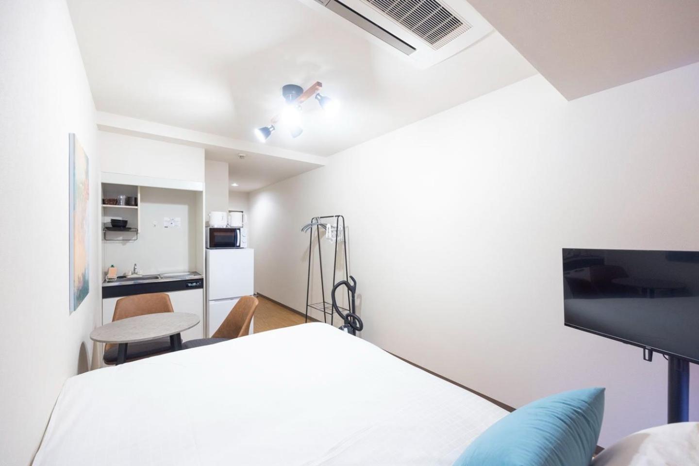 Apartamento Shinjuku Okada Building Tokio Habitación foto